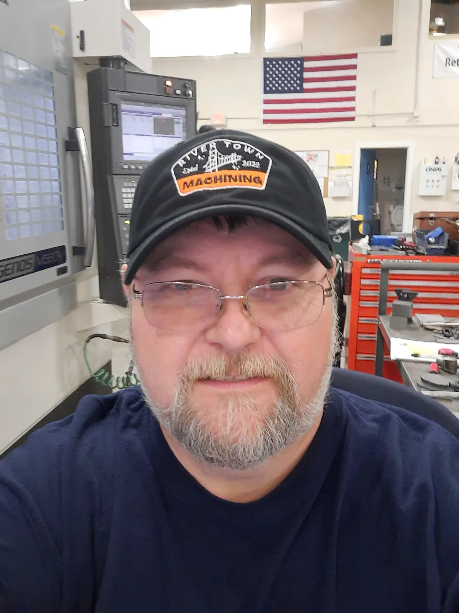 Joe Robak, ISO 9001 consultant on a CNC shop floor in Southern Indiana